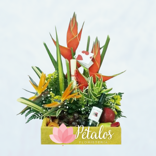 Arreglo Floral con Heliconias, aves del paraíso y vino